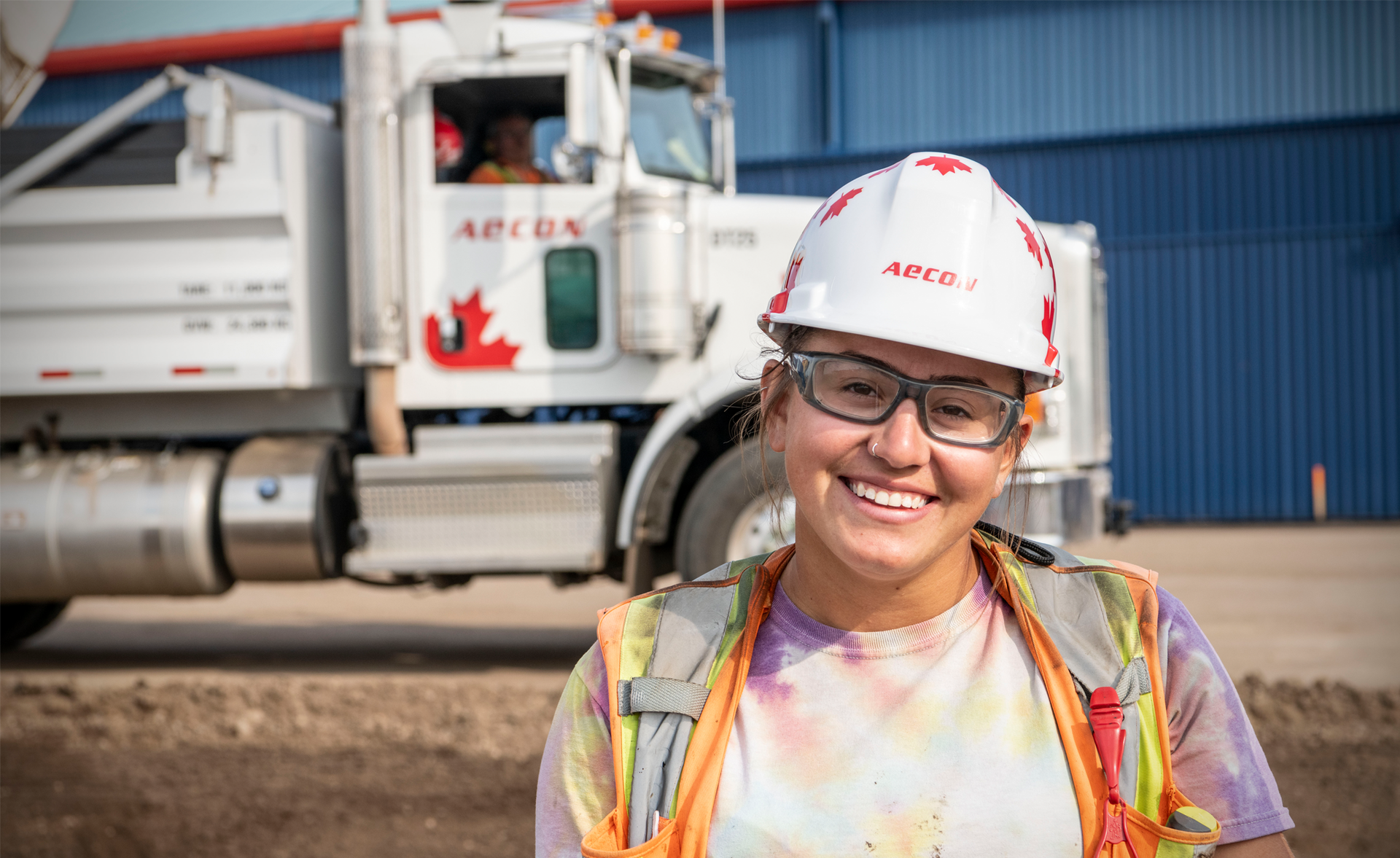 Woman smiling in hardhat